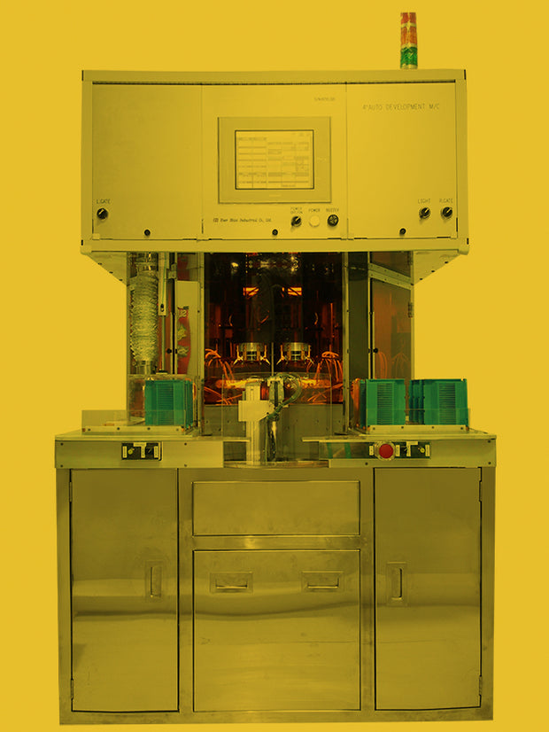 e.  Fully automatic four-axis developing and fixing machine