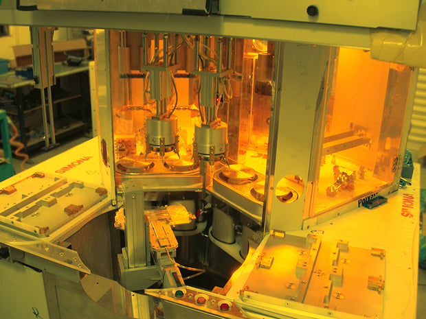 e.  Fully automatic four-axis developing and fixing machine
